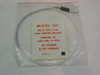 Trimedyne Model 317 fiber optic cable in original sealed plastic bag with manufacturer label showing model, 2.5mm OD Optiscope compatibility, and serial number