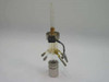 TMA quartz sample holder assembly — full upright view showing quartz column, stainless steel base piston, multiple tube fittings, and wire leads with visible yellowing and staining
