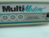 MultiTech MultiModem II front panel close-up showing MT932 Series Intelligent Modem label with TR, EC, FX indicator lights and Answ/Orig/Voice/Data labels