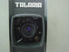 GE Talaria PJ5055C1 — close-up of projection lens housing with Talaria nameplate; multi-element lens assembly visible inside dark housing