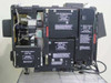 GE Talaria PJ5055C1 — internal module bay open showing Auxiliary Power Module, Lamp Power Module (70/1700), AC Input Module, and High Voltage Module with warning labels; wiring and connectors visible