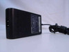 Toshiba PA3083U-1ACA AC adapter side view showing Toshiba branding label and rating plate