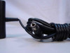 Toshiba PA3083U-1ACA DC output barrel plug connector closeup showing coiled DC cable