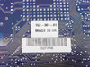 Close-up of Madge 152-301-01 part number label reading '152-301-01 MADE IN UK' with barcode label 92FAAB on PCB