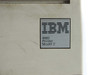 IBM 4683 Printer Model 2 nameplate close-up showing IBM logo and model designation on silver brushed-metal label