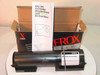 Xerox 6R708 black dry ink toner cartridge removed from box alongside dry ink cartridge replacement and return instructions booklet