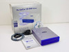 LaCie SE2100 CD-RW USB 2.0 external drive with original retail box, USB cable, user's guide, and Toast software disc laid out in front