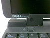 Dell Latitude CPi D266XT cracked LCD hinge close-up showing Dell Latitude branding and cracked plastic at hinge joint