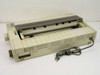 Epson ActionPrinter 4500 dot matrix printer – rear three-quarter view showing Centronics parallel port, AC power cord, and ventilation slots
