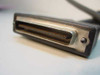 Close-up of DB25 female connector end of parallel printer cable showing pin contacts