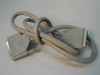 DB25 male to female serial extension cable full length coiled view showing both connector ends