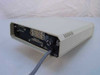 Adtran DSU II AR rear panel angled view showing Primary RS-232 DB25 port, Primary V.35 DB37 port, Secondary Channel DB25 port, Telco RJ48S port, and fuse/power section with cable attached