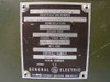 GE DDTU 97424-A2535XG70 — data plate showing Identification Number, Nomenclature (Data Display and Transfer Unit), Design Code GE-07482, FSN 97424-A2535XG70, Federal Stock Number 4920-01-199-8483, Contract Number GD8A0029, Serial Number, and General Electric Cincinnati Ohio 45215 Made in USA markings