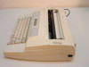 Sears 161 electronic typewriter side profile view showing carriage assembly, paper path, and power cord