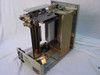 Plasmon 555700-000 internal view showing robotics mechanism, disc transport rails, lift assembly, and power supply with outer panels removed
