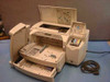 HP C2685A 2500CM color printer with top cover and ink cartridge bay open, revealing internal mechanism and four ink cartridge slots with cartridges installed