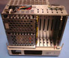 Octel Aspen Branch XP chassis interior from above-rear showing power supply, card cage with installed boards, wiring harness, and open card slots