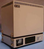 Octel Aspen Branch XP Voice Processing System – front-right three-quarter view showing beige tower enclosure with Co-Tel badge and component label on lower right