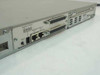 Bay Networks BayStack 101 rear panel close-up showing Segment Select switch, Management Extension In/Out ports, Reset button, and expansion connectors