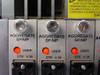Close-up of three Aggregate SP/MP DTE V.35 card faceplates with orange USER indicator LEDs and V.35 Winchester-style connectors