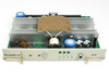 Nortel QPC691A 5/12 CONV 2 power converter — front panel view showing card bracket with 'QPC691A-A' designation, three green LED status indicators (+12V, -12V, +5V, GND labels), and 'RS' port