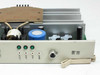 Nortel Meridian QPC691A — front panel close-up showing LED indicators labeled +12V, -12V, +5V, GND and RS connector on right side of beige bracket