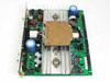 Nortel QPC691A 5/12V Power Converter — side-angle top view showing full PCB with heatsink assembly, TO-3 power transistors, large electrolytic capacitors, and transformer