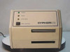 DH Print 546 Cypher IV thermal label printer – front panel close-up showing Power, Ready, and Strip Mode LEDs and Label Advance button