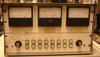 McPherson 815 Pumping Control System front panel showing three analog meters, push-button controls, and broken center gauge glass
