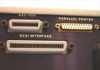 Tekelec TE713 rear panel close-up showing IEEE-488, Parallel Printer, and SCSI Interface connectors