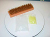 OPTIBREED SQA III consumables — orange-pin cuvette rack on foam block, bag of clear cuvettes, and bag of yellow pipette tips