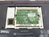 Dell Latitude CPi D300XT internal view with RAM bay cover removed, showing empty RAM slots, motherboard REV A06, and Dell part number label