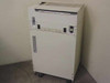 HP C2354A 2300 Line Printer – front right angle view showing paper feed slot, operator panel area, and cabinet on casters