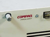 Compaq ProLiant badge and front panel lock detail — close-up of front bezel