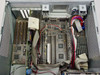 Interior top-down view of motherboard showing Pentium processor, DRAM SIMMs, EISA and PCI expansion slots, and ribbon cable routing