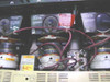 Barco Graphics 400 internal CRT tube section showing CAUTION X-radiation and high vacuum picture tube warning labels on three tubes with wiring harness
