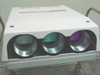 Barco Graphics 400 CRT projector front view showing three large RGB CRT lens barrels in white housing