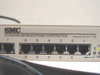 SMC Standard Microsystems Corporation label on front panel showing ports 1–7 with RJ-45 connectors and X port-active indicators