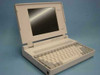 Toshiba T4400SXC laptop open from front-left angle showing full keyboard and LCD display