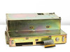 Astec AA13010 DEC H 7260 power supply – front-right angle view with ribbon cable and orange IDC connector attached, scratches visible on zinc chassis