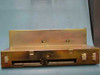Astec AA13010 DEC power supply – top/front view showing stepped brass chassis with dual card-edge connector slots and white Molex output connectors