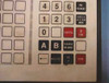 Snap Systems 4 POS keypad lower section — numeric keys, A/B keys, Taxable or Adult, Delete, Enter, and ID keys