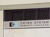 HP 7418A System nameplate closeup – Hewlett-Packard logo and model designation on top vent panel