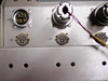 Closeup of internal connector panel – circular multi-pin connectors labeled J18, J17, J16, J28, J27, J26 with wiring attached