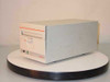 Unisys M610 External WORM Optical Disc Drive – left-side three-quarter view showing beige desktop enclosure with drive slot and eject mechanism
