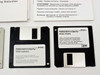 Three IBM floppy disks shown: PCMCIA 28.8/14.4 Data/Fax Modem Diskette, WIN95 Installation disk, and modem diskette with part number labels visible