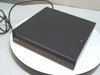 Datatel DCP3080 CSU/DSU Modem Interface Module – top and left side view, black desktop enclosure with power cord attached