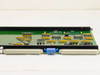 Wellfleet BNC 73000 104276-05 — rear view showing component side with ICs, DIP switches, and blue connector block