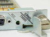 Bay Networks SRML 75000 faceplate close-up showing SRML 75000 designation, VCC LED indicator, and DB-9 connector