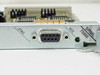 Bay Networks SRML 75000 faceplate showing JTAG port label, VCC LED, and DB-9 serial connector detail